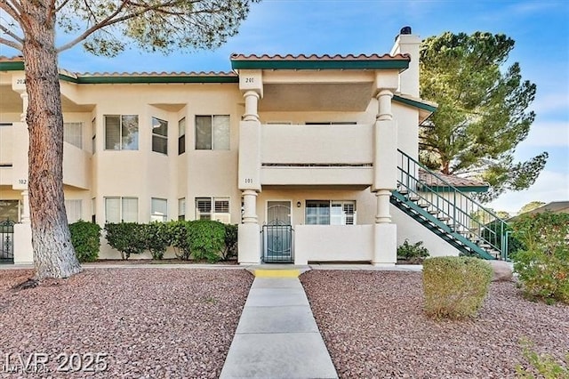 901 Sulphur Springs Ln Unit 101, Las Vegas, NV 89128 - view of building exterior featuring stairway