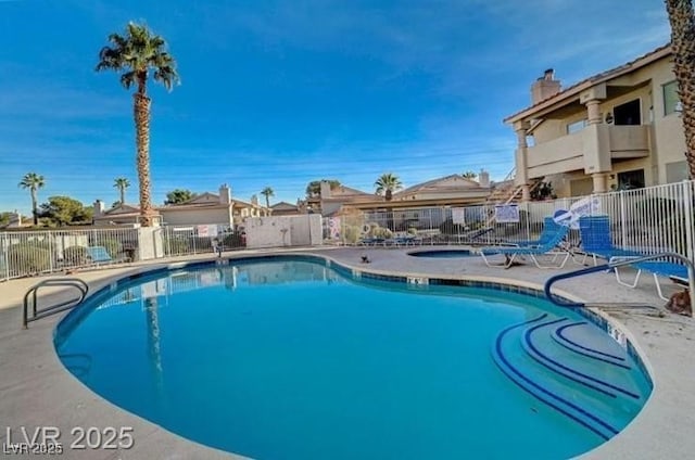 901 Sulphur Springs Ln Unit 101, Las Vegas, NV 89128 - community pool with a residential view and a patio area