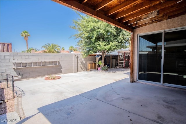 4945 Volcanic Rock Ln, Las Vegas, NV 89122 - fenced backyard with a patio area