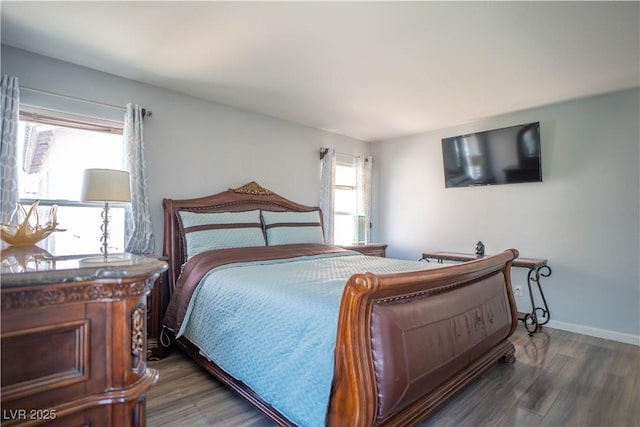 4945 Volcanic Rock Ln, Las Vegas, NV 89122 - bedroom featuring wood finished floors and baseboards