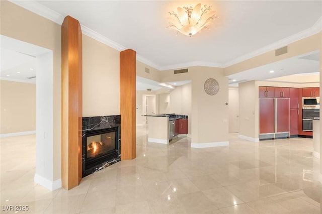 2747 Paradise Rd Unit 2704, Las Vegas, NV 89109 - unfurnished living room with ornamental molding, light tile patterned floors, and a fireplace