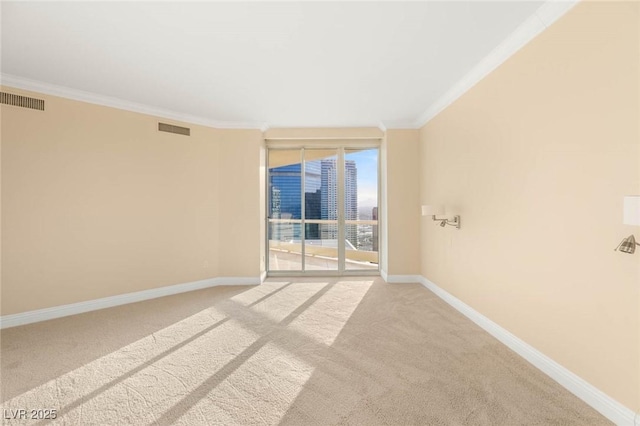 2747 Paradise Rd Unit 2704, Las Vegas, NV 89109 - empty room featuring light carpet and ornamental molding