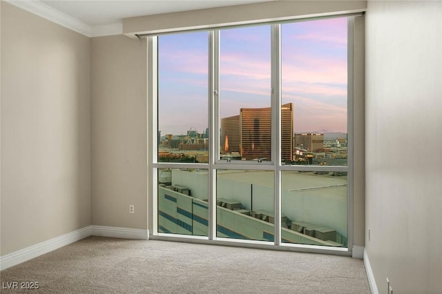 2747 Paradise Rd Unit 2704, Las Vegas, NV 89109 - empty room featuring carpet floors and crown molding