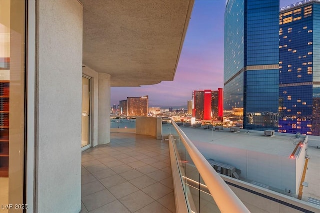 2747 Paradise Rd Unit 2704, Las Vegas, NV 89109 - balcony at dusk featuring a view of city