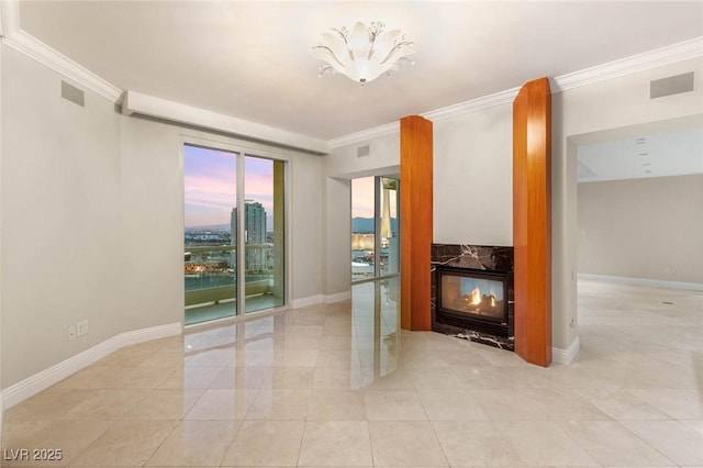 2747 Paradise Rd Unit 2704, Las Vegas, NV 89109 - unfurnished living room featuring ornamental molding and light tile patterned floors