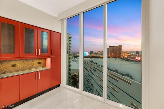 2747 Paradise Rd Unit 2704, Las Vegas, NV 89109 - bar area featuring ornamental molding, a view of city, and decorative backsplash