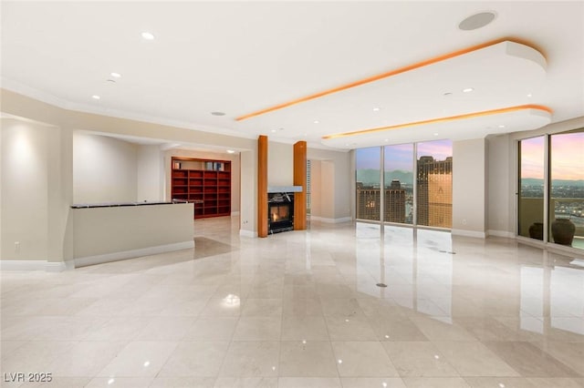 2747 Paradise Rd Unit 2704, Las Vegas, NV 89109 - unfurnished room with light tile patterned floors, a multi sided fireplace, and recessed lighting