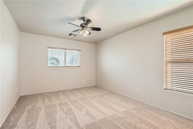 5021 Ropers Rock Ct, Las Vegas, NV 89131 - unfurnished room featuring light carpet and a ceiling fan