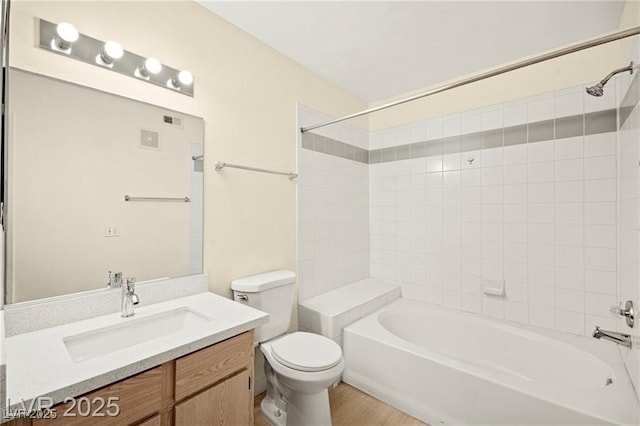 7885 W Flamingo Rd Unit 1131, Las Vegas, NV 89147 - full bath featuring tub / shower combination, vanity, and wood finished floors
