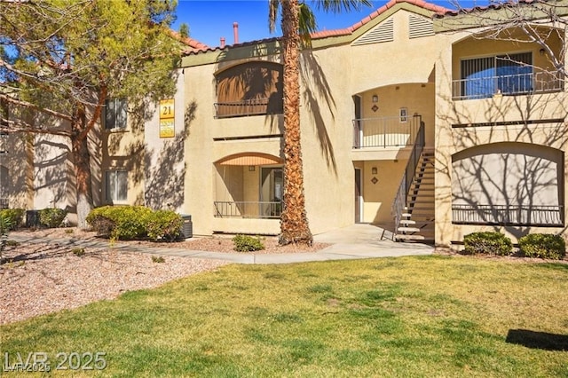 7885 W Flamingo Rd Unit 1131, Las Vegas, NV 89147 - view of building exterior featuring stairs
