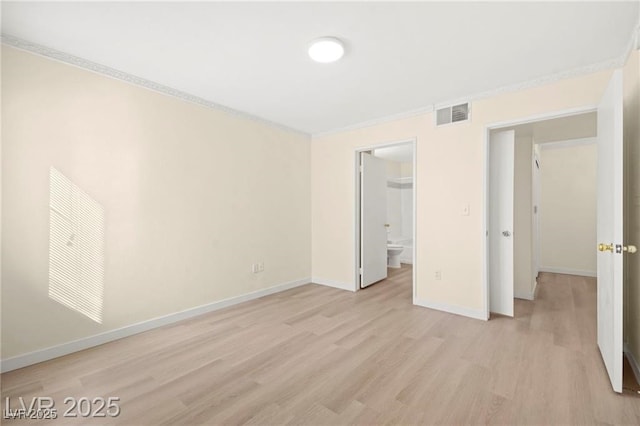 7885 W Flamingo Rd Unit 1131, Las Vegas, NV 89147 - unfurnished bedroom with light wood finished floors and crown molding