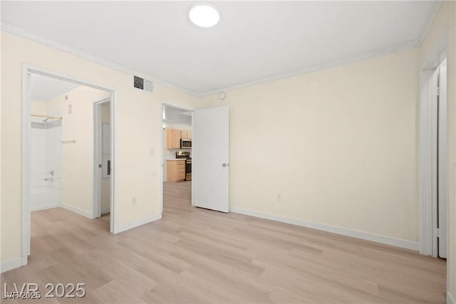 7885 W Flamingo Rd Unit 1131, Las Vegas, NV 89147 - unfurnished bedroom featuring light wood-type flooring and ornamental molding