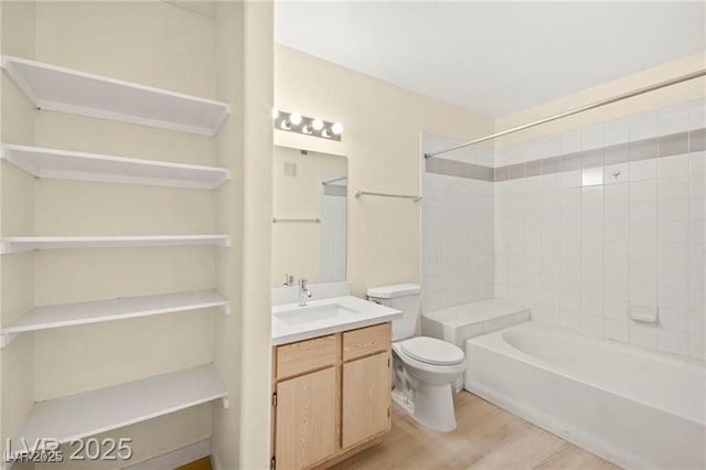 7885 W Flamingo Rd Unit 1131, Las Vegas, NV 89147 - bathroom featuring vanity,  shower combination, and wood finished floors