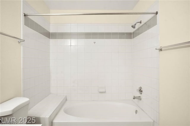 7885 W Flamingo Rd Unit 1131, Las Vegas, NV 89147 - bathroom featuring toilet and washtub / shower combination