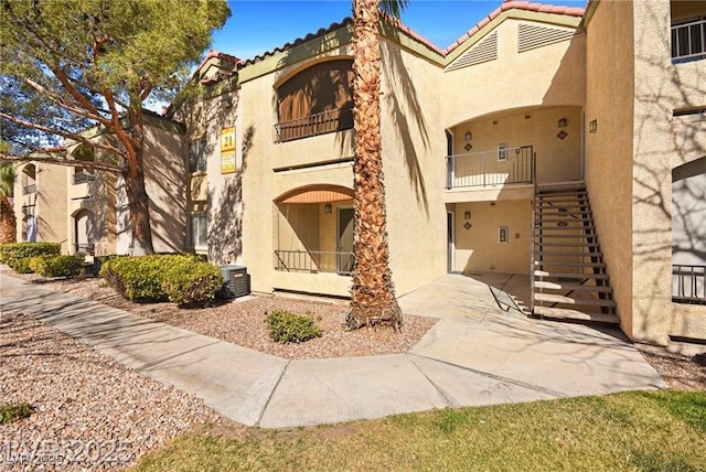 7885 W Flamingo Rd Unit 1131, Las Vegas, NV 89147 - view of building exterior with stairs