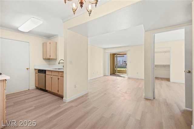 7885 W Flamingo Rd Unit 1131, Las Vegas, NV 89147 - kitchen featuring dishwasher, light countertops, a chandelier, and light wood-type flooring