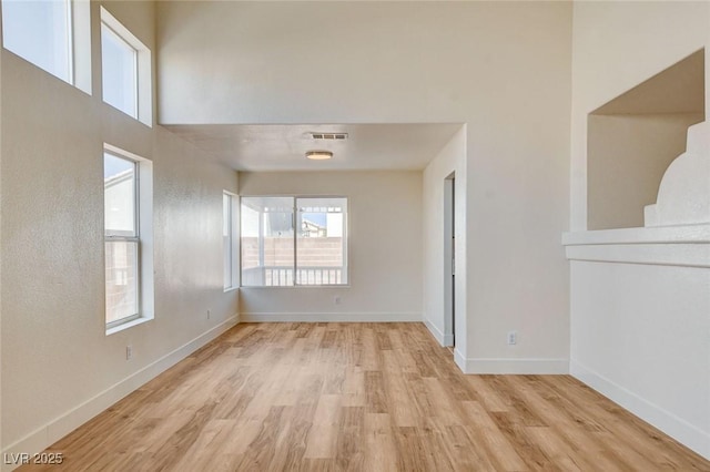1716 Klamath Falls Way, Las Vegas, NV 89128 - unfurnished room featuring wood finished floors and baseboards