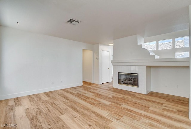 1716 Klamath Falls Way, Las Vegas, NV 89128 - unfurnished living room with wood finished floors and a fireplace