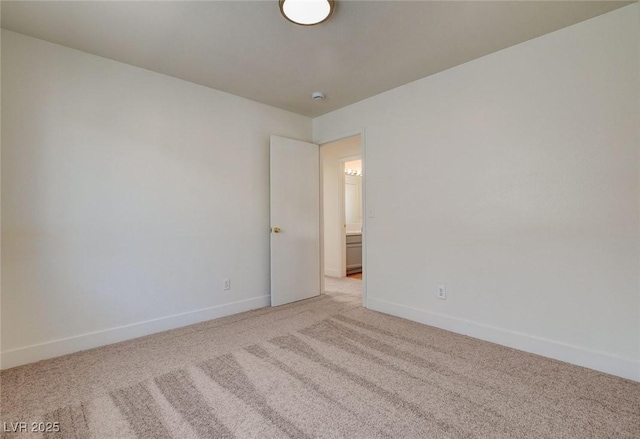 1716 Klamath Falls Way, Las Vegas, NV 89128 - spare room featuring light carpet and a smoke detector