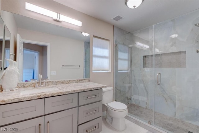 1910 Coyote Pass Way, Henderson, NV 89012 - bathroom featuring vanity and a marble finish shower
