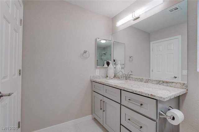 1910 Coyote Pass Way, Henderson, NV 89012 - bathroom featuring vanity and baseboards