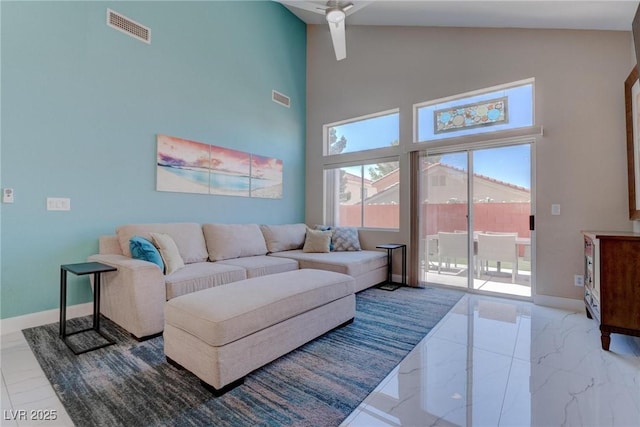 1910 Coyote Pass Way, Henderson, NV 89012 - living room featuring high vaulted ceiling, ceiling fan, and marble finish floors