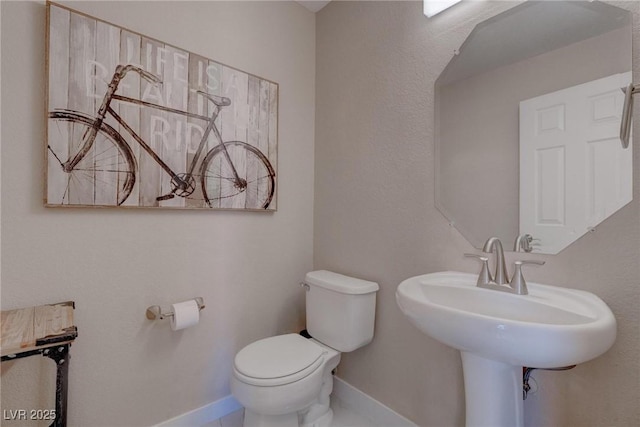 1910 Coyote Pass Way, Henderson, NV 89012 - half bathroom with toilet and baseboards