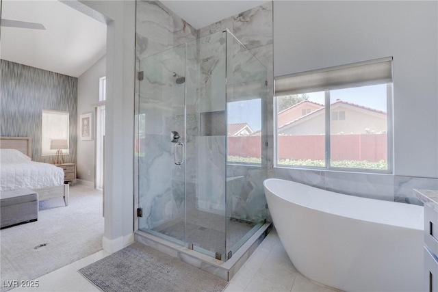 1910 Coyote Pass Way, Henderson, NV 89012 - full bath with plenty of natural light, a freestanding bath, ensuite bath, a marble finish shower, and vaulted ceiling