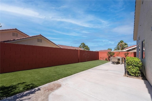 1910 Coyote Pass Way, Henderson, NV 89012 - fenced backyard featuring a patio