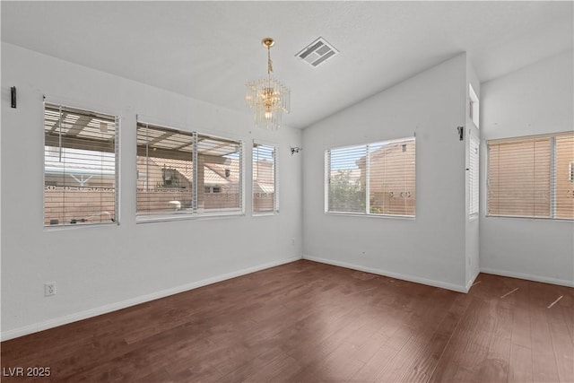 920 Serpentina Ave, Las Vegas, NV 89123 - spare room with wood finished floors, a chandelier, and lofted ceiling
