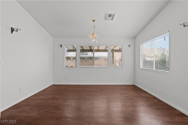 920 Serpentina Ave, Las Vegas, NV 89123 - unfurnished room with a chandelier and wood finished floors