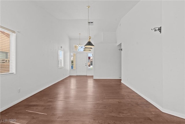 920 Serpentina Ave, Las Vegas, NV 89123 - unfurnished living room with wood finished floors and a chandelier