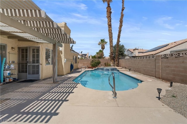 920 Serpentina Ave, Las Vegas, NV 89123 - view of pool featuring a patio, a fenced backyard, and a pool with connected hot tub