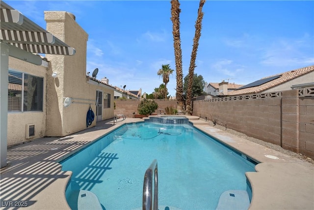 920 Serpentina Ave, Las Vegas, NV 89123 - view of swimming pool with a fenced backyard, a pool with connected hot tub, and a patio area