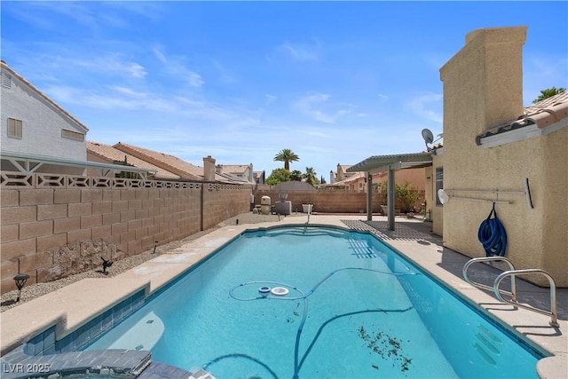 920 Serpentina Ave, Las Vegas, NV 89123 - view of swimming pool featuring a fenced backyard, a patio, and a pool with connected hot tub