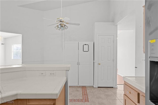 920 Serpentina Ave, Las Vegas, NV 89123 - bathroom featuring tile patterned floors, ceiling fan, and a high ceiling