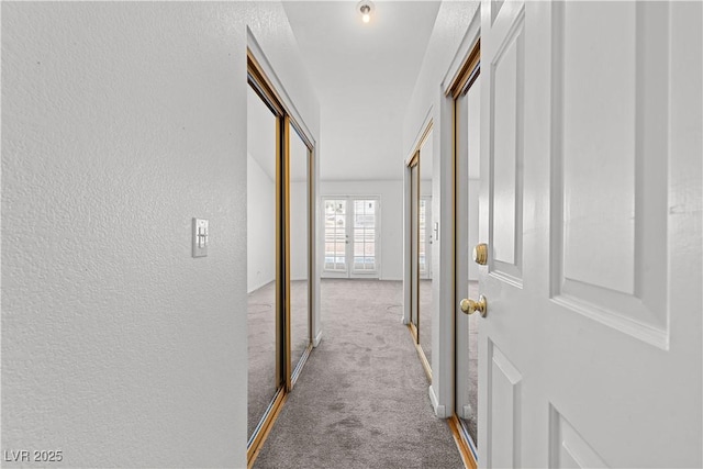 920 Serpentina Ave, Las Vegas, NV 89123 - hallway featuring carpet floors and a textured wall