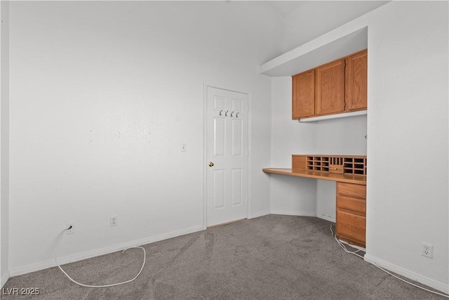 920 Serpentina Ave, Las Vegas, NV 89123 - unfurnished office with built in desk and carpet flooring