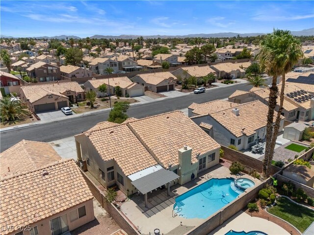 920 Serpentina Ave, Las Vegas, NV 89123 - aerial perspective of suburban area with a pool and mountains