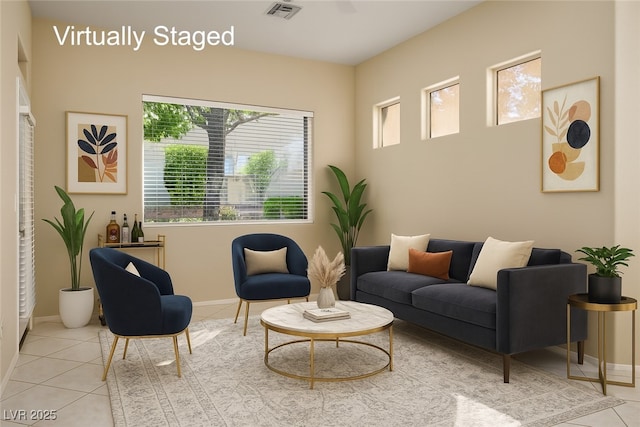 10305 Snyder Ave, Las Vegas, NV 89134 - tiled living room featuring baseboards