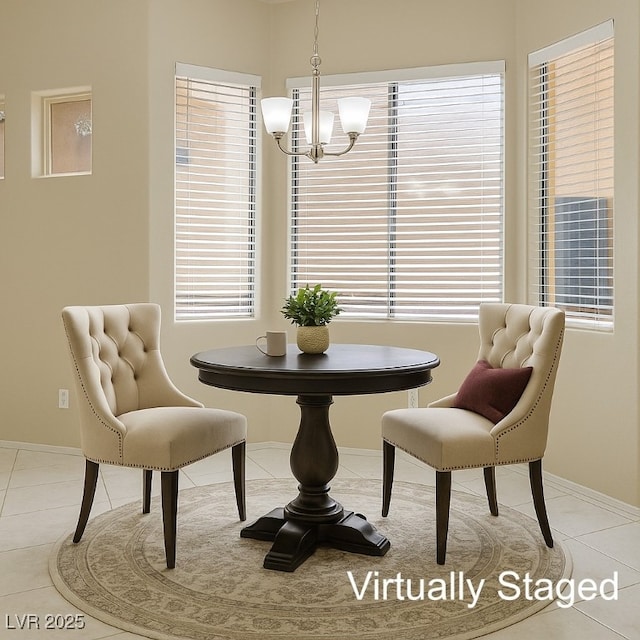 10305 Snyder Ave, Las Vegas, NV 89134 - tiled dining area with a chandelier and plenty of natural light