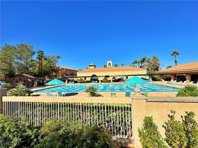 10305 Snyder Ave, Las Vegas, NV 89134 - community pool featuring a patio