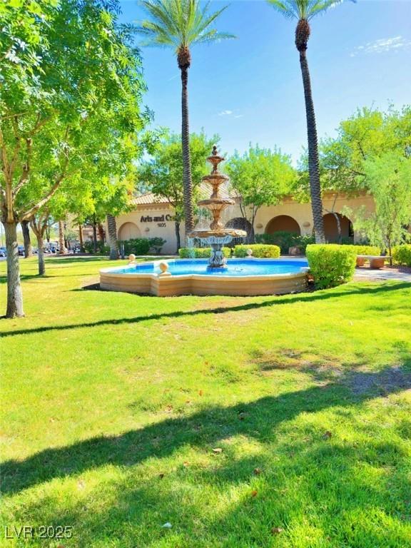 10305 Snyder Ave, Las Vegas, NV 89134 - view of home's community with a lawn
