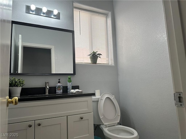 8901 Kingswood Dr, Las Vegas, NV 89147 - bathroom with vanity and a textured wall