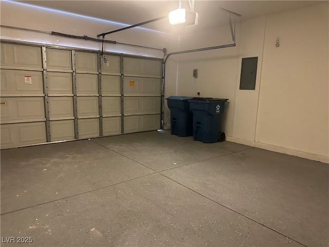 8901 Kingswood Dr, Las Vegas, NV 89147 - garage featuring electric panel and a garage door opener