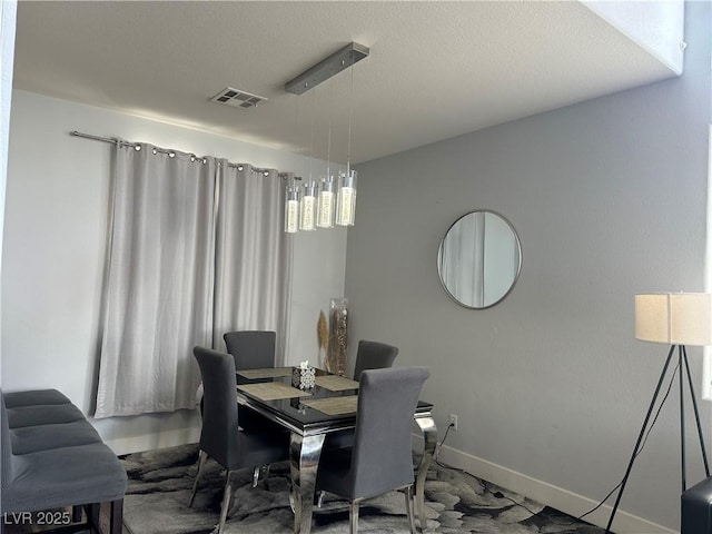 8901 Kingswood Dr, Las Vegas, NV 89147 - dining room featuring baseboards