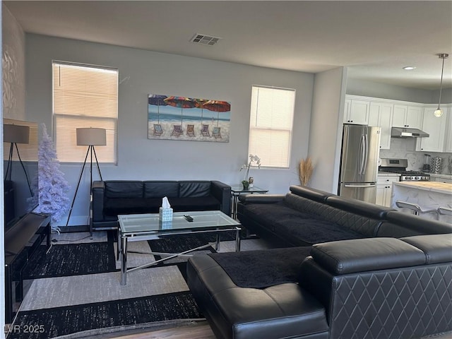 8901 Kingswood Dr, Las Vegas, NV 89147 - living area with wood finished floors and recessed lighting