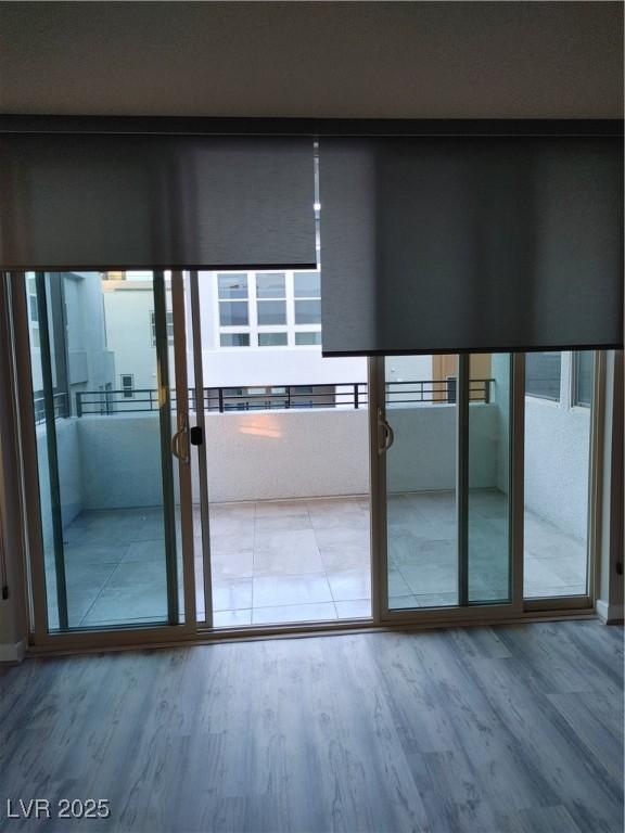 646 Spotted Falcon St, Las Vegas, NV 89138 - doorway featuring wood finished floors and plenty of natural light