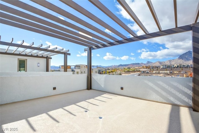 646 Spotted Falcon St, Las Vegas, NV 89138 - view of patio with a pergola and a mountain view