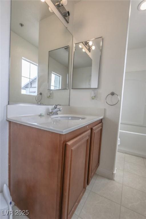 1135 Paradise Mountain Trl, Henderson, NV 89002 - full bath featuring vanity, tile patterned floors, and bathing tub / shower combination